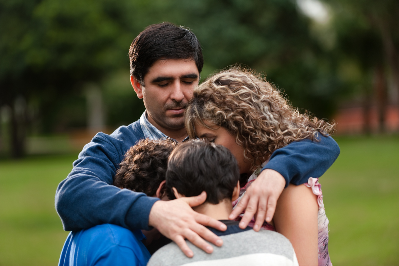 Father protecting his family